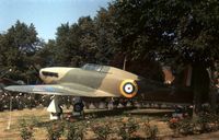 LF738 @ BQH - Now exhibited in the RAF Museum, this Hurricane IIC was a gate guardian at the Battle of Britain Memorial Chapel at Biggin Hill as seen in the Summer of 1975. - by Peter Nicholson