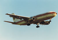 SU-GAC @ EGLL - AIRBUS A300B4-203 landing Heathrow - by moxy