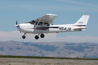 N54JA @ SQL - 1998 Cessna 172R over the threshold - by Steve Nation