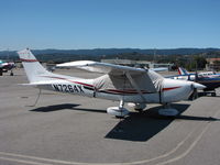 N7264X @ SQL - 1999 Cessna 182S on visitor's ramp - by Steve Nation
