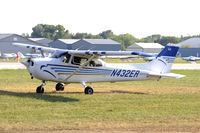 N432ER @ KOSH - Taxi to parking - by Todd Royer