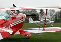 G-CDMS @ EGHP - MIKE SIERRA TAXYING PAST A GLEAMING G-EWIZ - by BIKE PILOT