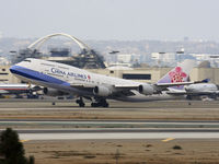 B-18211 @ KLAX - Asian heavy at lift off on rwy 25R. Admire motion blur in the blackground ;-) - by Philippe Bleus