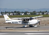 N51989 @ KSQL - Locally-based 2002 Cessna 172S running-up engine - by Steve Nation