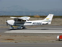 N51989 @ KSQL - Locally-based 2002 Cessna 172S on take-off - by Steve Nation