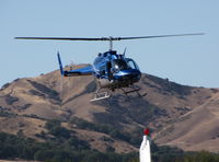 N10KX @ 1O2 - 1975 Bell 206B on approach to Lampson Field (no longer dusting) - by Steve Nation