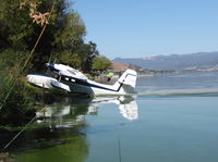 N111W - Looking more like an RC model this beautifully maintained 1945 Grumman G-44A powers up ramp to old Natural High School Field for Clear Lake (Lakeport), CA on 30th Annual CL Splash-in - by Steve Nation