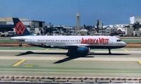 N640AW @ KLAX - View from Tom Bradley terminal of one of the crossing taxiways - by Noel Kearney