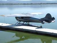 N3877V - Float-equipped 1949 Cessna 195 at Clear Lake boat dock near Lakeport, CA - by Steve Nation