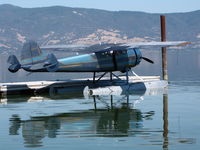 N3877V - Float-equipped 1949 Cessna 195 at Clear Lake boat dock near Lakeport, CA - by Steve Nation