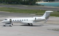N185GA @ TNCM - As you see they are being handle by ground handlers - by Daniel Jef