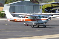 N68472 @ 1O2 - Christiansen Aviation 1978 Cessna 152 taxiing by flyable Grumman TF-1 @ Lampson Field - by Steve Nation
