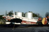 N128V @ APF - C-45H of Collier Mosquito Control as seen at Naples in November 1979. - by Peter Nicholson