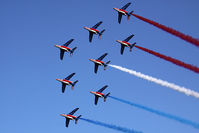 E135 - Patrouille de France, the French Air Force aerobatic team, performing a flyover of the Yorktown Victory Monument in Yorktown, VA to signify the age-old alliance between the United States and France that traces its roots to the Revolutionary War. - by Dean Heald