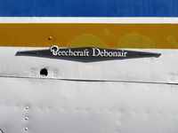 N330Z @ SZP - 1960 Beech 35-33A DEBONAIR, Continental IO-470-J 225 Hp, logo - by Doug Robertson