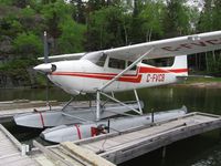 C-FVCB @ CYFO - Early model 1953 Cessna 180 at a private dock in Northern Manitoba. - by Trevor Highmoor