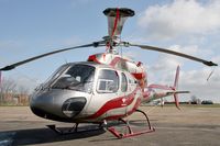 G-DOOZ @ EGTC - Aerospatiale AS355F2 at Cranfield Airport. An Ecureil 2 with rotors tied on a windy day! - by Malcolm Clarke