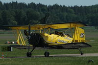 SE-KXR @ ESOW - The Ag-Cat cropduster of Scandinavian Air Show with two wing walkers on board, at Västerås Hässlö airport, Sweden. - by Henk van Capelle