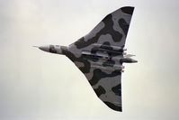 XH558 @ EGDM - Avro Vulcan B2. Arguably the most photogenic of large military aircraft seen here performing at Boscombe's Battle of Britain Air Show in 1990. - by Malcolm Clarke