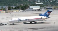 N909PG @ TNCM - Being push back from its parking - by Daniel Jef