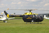 G-PASX @ EGCJ - MBB BO 105DBS-4 Air Ambulance on-call at Sherburn's Fly-in and Veteran Car Meet in 2004. - by Malcolm Clarke