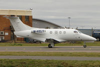 M-KELY @ EGGW - Manx registered Embraer Phenom at Luton - by Terry Fletcher
