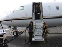 N1RL @ ORL - Two pretty hostesses welcome me aboard a former Indianapolis Speedway CRJ-700 - by Florida Metal