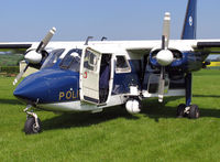 G-NESU @ FISHBURN - Pilatus Britten-Norman BN2B-20 Islander at Fishburn Airfield, Co Durham, UK in 2004. Cooling the cabin whilst waiting for the next call on a warm Spring afternoon. Northumbria Police Authority. - by Malcolm Clarke