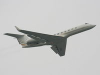VP-BNE @ EGGP - Jet Aviation Business Jets - by Chris Hall