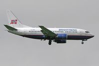 LN-BRR @ EGNT - Boeing 737-505 on approach to rwy 07 at Newcastle, UK. - by Malcolm Clarke