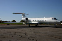 N102BG @ KSVH - Sitting on the ramp without a cloud in the sky except for a short contrail. - by Jamin