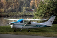 C-FFWE @ CYPK - With Fraser River - by Doug R. Matheson