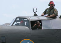 N24927 @ LNC - Warbirds on Parade 2009 - at Lancaster Airport, Texas - Pilot saluting and the Flight engineer watching from his hatch in the roof!