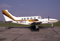 G-SMJJ @ EGTC - Cessna 414A Chancellor at Cranfield Airport, UK in 1988. - by Malcolm Clarke