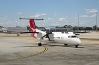 VH-TQD @ YMML - Bombardier DHC-8-315Q Dash 8 at Melbourne International. - by Malcolm Clarke