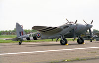 G-ASKH @ EGTC - De Havilland DH-98 Mosquito T3. At the 50th anniversary celebration of Cranfield's College of Aeronautics, Cranfield, UK. - by Malcolm Clarke