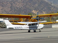 N361ES @ CCB - Taxiing back to runway 24 passing the Antonov - by Helicopterfriend