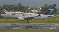 C-GWCN @ TNCM - West jet landing at St Maarten - by Daniel Jef