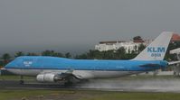 PH-BFH @ TNCM - KLM rolling on a very wet runway - by SHEEP GANG