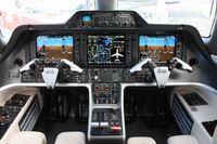 PP-XVM @ ORL - Phenom 300 cockpit - by Florida Metal