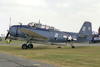 N6827C @ EGWZ - General Motors TBM-3E Avenger. In the colours of Lt George Bush's VT-51 Sqn at Air Tattoo '90, RAF Alconbury - by Malcolm Clarke