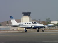 N4674N @ POC - Taxiing to 26L with Brackett Tower in the background - by Helicopterfriend