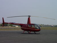 N144PC @ POC - Parked eastside near a Robinson R22 - by Helicopterfriend