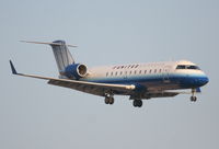 N27191 @ KORD - Mesa Airlines Canadair CL-600-2B19, ASH7022 arriving from KGRR, short final 22R KORD. - by Mark Kalfas