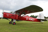 G-AMZI @ EGSX - Visitor to the 2009 Air Britain fly-in. - by MikeP