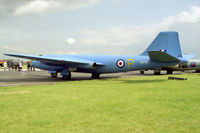 WJ877 @ EGUY - English Electric Canberra T4. WJ877 from 231 OCU RAF Wyton, disguised as the A1 prototype VN799 and seen here at the Canberra 40th Anniversary Celebration Photocall at RAF Wyton in 1989. - by Malcolm Clarke