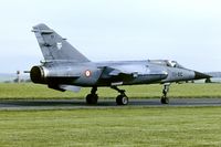 101 @ EGXB - Mirage F1 taxying to the active at RAF Binbrook - by FBE