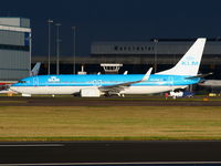 PH-BXE @ EGCC - KLM B737 arriving on RW 23R as the storm clouds roll in - by Chris Hall