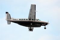 N169LJ @ PABE - Frontier Alaska Cessna 208 landing Runway 18 - by Martin Prince, Jr