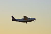 N847FE @ CID - Departing Runway 27 - by Glenn E. Chatfield